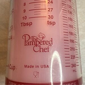 Pampered Chef Pink Measuring Cup with Red Markings